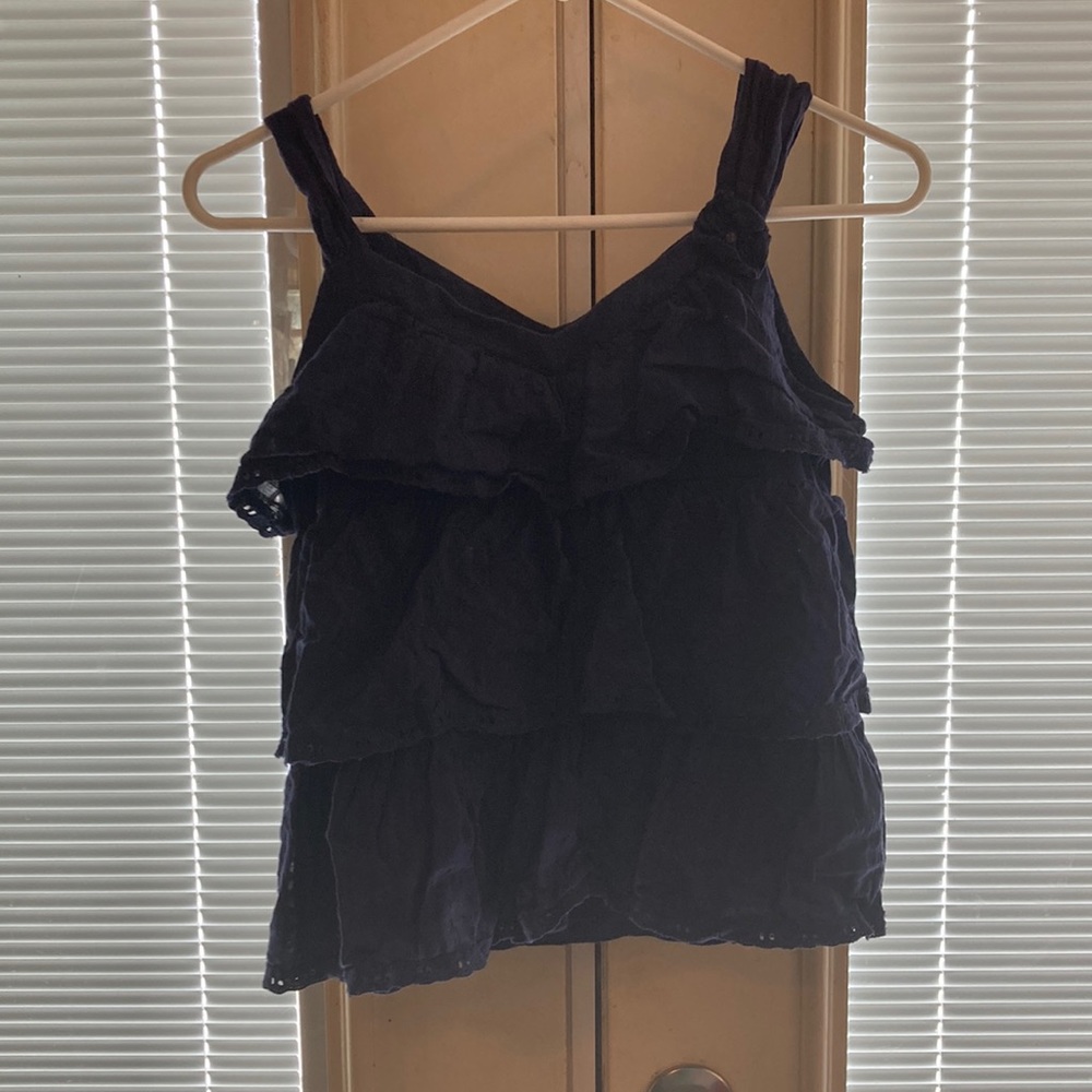 Cute kids top that has a type of ruffle design going on